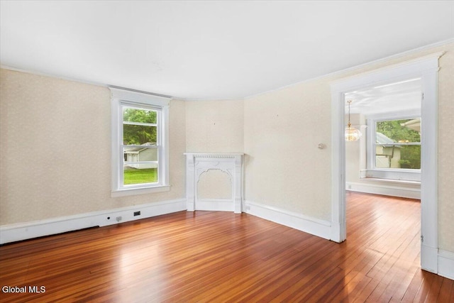 104 Euclid Ave, Altamont, NY 12009 - spare room featuring hardwood / wood-style flooring and crown molding