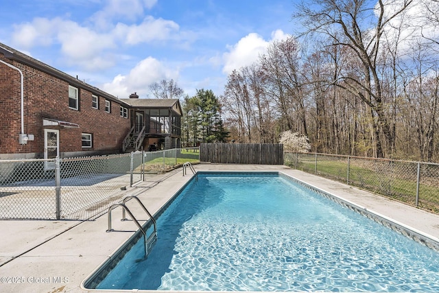 view of pool with fence and a fenced in pool