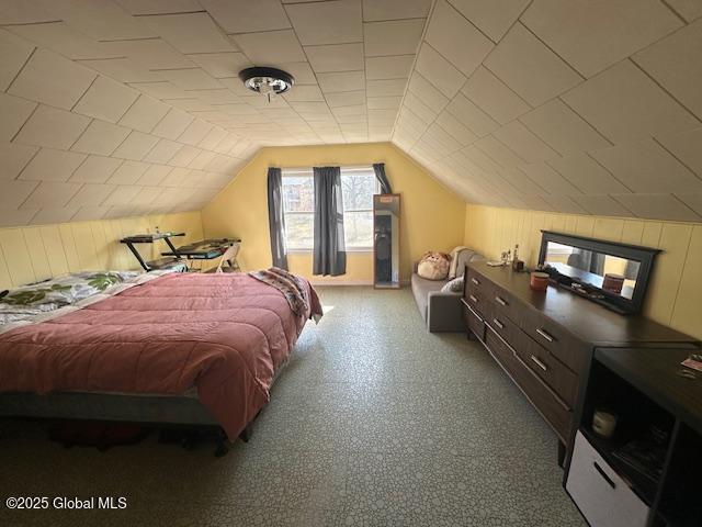 2543 Moriah Rd, Moriah, NY 12960 - bedroom with wooden walls and vaulted ceiling
