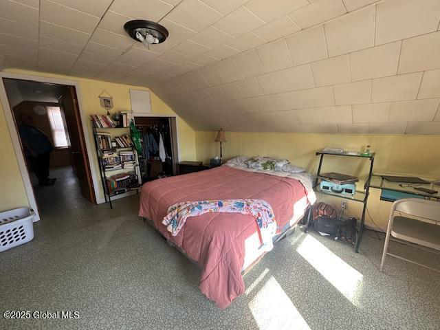 2543 Moriah Rd, Moriah, NY 12960 - bedroom featuring a closet and vaulted ceiling