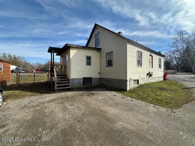 2543 Moriah Rd, Moriah, NY 12960 - view of side of property featuring fence