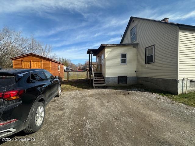 2543 Moriah Rd, Moriah, NY 12960 - view of property exterior with fence
