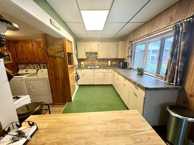 16 Pumphouse Rd, Lake Luzerne, NY 12846 - kitchen with a paneled ceiling, separate washer and dryer, and a sink