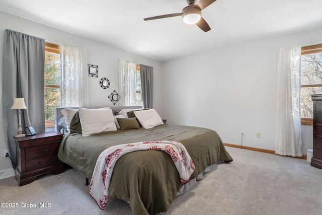 bedroom featuring carpet floors, baseboards, and ceiling fan