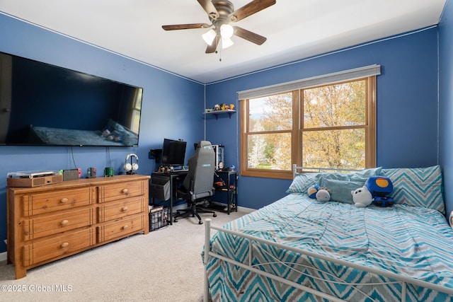 bedroom with carpet flooring, baseboards, and ceiling fan
