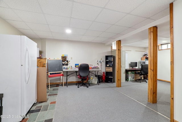 office space featuring a paneled ceiling