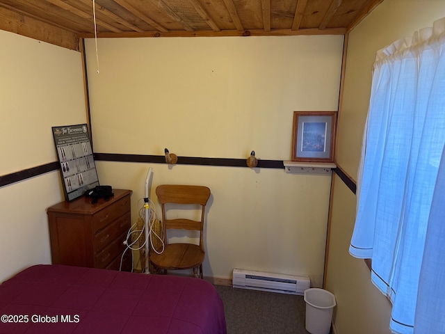 bedroom with wooden ceiling, carpet floors, and baseboard heating
