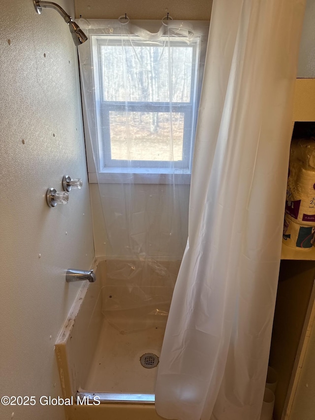 full bath featuring a stall shower