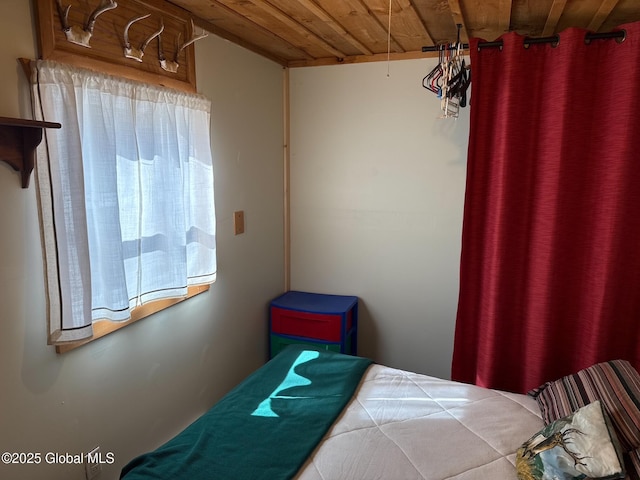 bedroom with wood ceiling