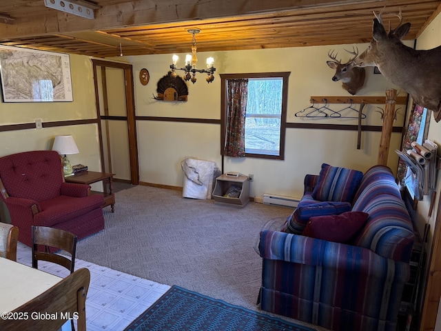 carpeted living room featuring a baseboard radiator, baseboards, wooden ceiling, and an inviting chandelier