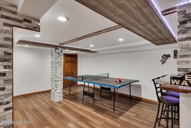 game room with decorative columns, baseboards, recessed lighting, and wood-type flooring
