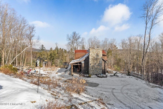 view of yard covered in snow
