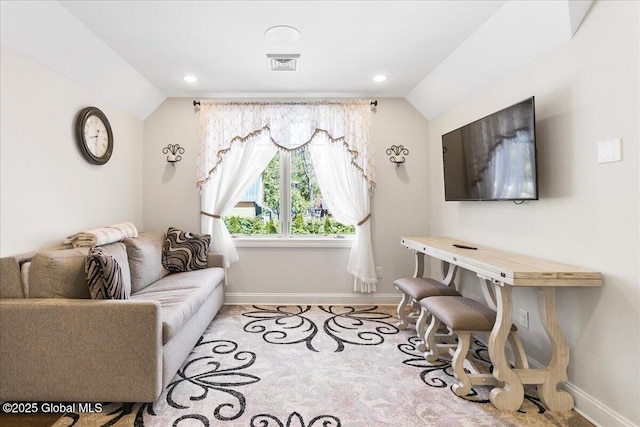 living room featuring recessed lighting, baseboards, visible vents, and lofted ceiling