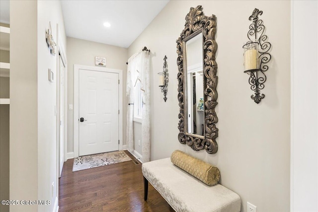entryway featuring recessed lighting, baseboards, and dark wood-style floors