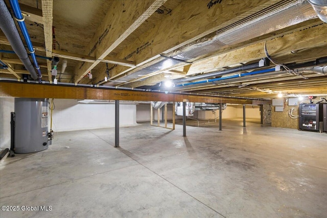unfinished basement featuring water heater