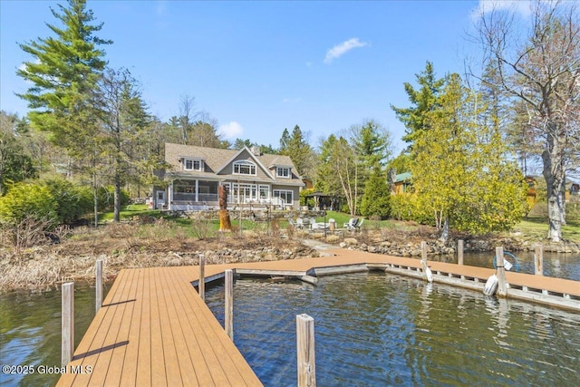 view of dock with a water view