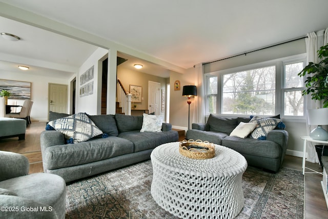 362 Lake Ave, Saratoga Springs, NY 12866 - living room featuring stairs, baseboards, and wood finished floors