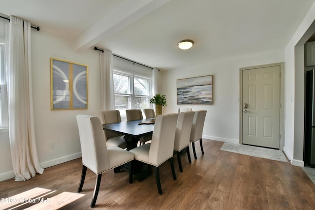 362 Lake Ave, Saratoga Springs, NY 12866 - dining space featuring baseboards, beam ceiling, and wood finished floors