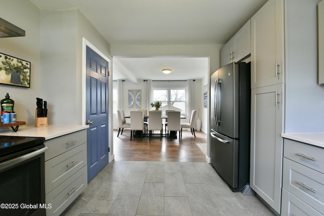 362 Lake Ave, Saratoga Springs, NY 12866 - kitchen featuring freestanding refrigerator, electric stove, gray cabinetry, and light countertops