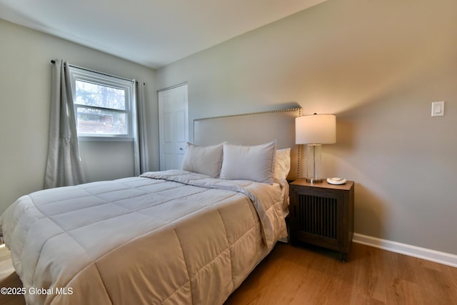 362 Lake Ave, Saratoga Springs, NY 12866 - bedroom with baseboards and wood finished floors