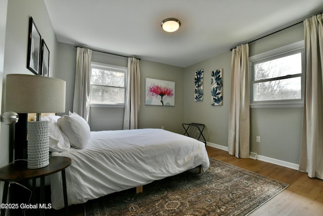 362 Lake Ave, Saratoga Springs, NY 12866 - bedroom with baseboards and wood finished floors