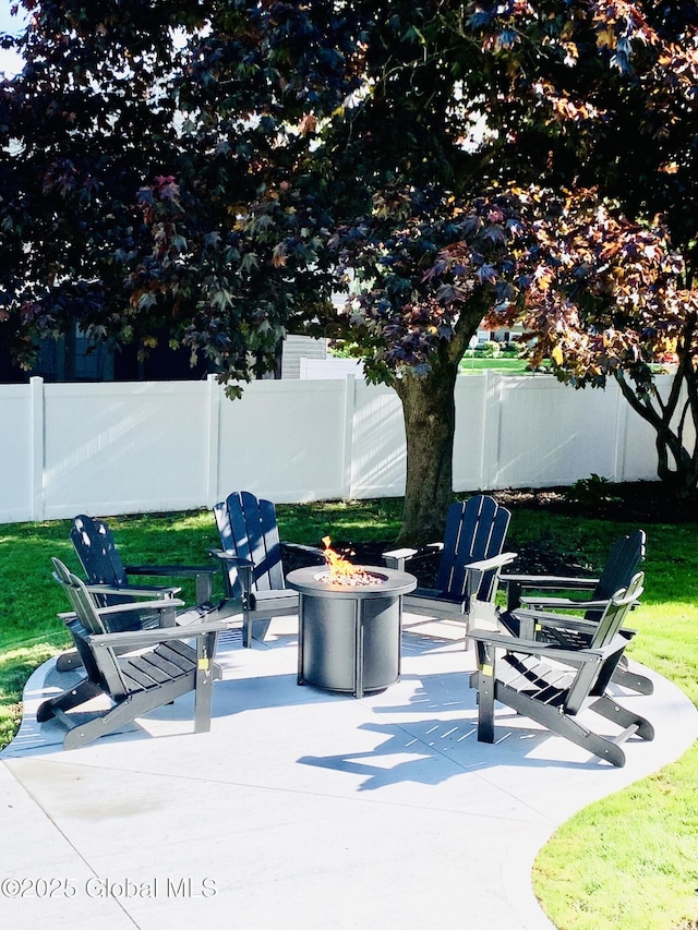 362 Lake Ave, Saratoga Springs, NY 12866 - view of patio featuring a fenced backyard and a fire pit