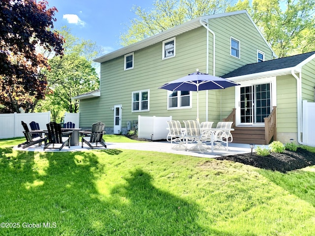 362 Lake Ave, Saratoga Springs, NY 12866 - back of property featuring fence, a yard, and a patio area