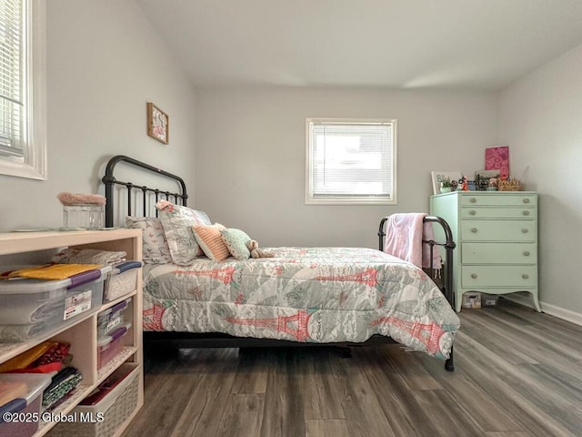 bedroom featuring wood finished floors