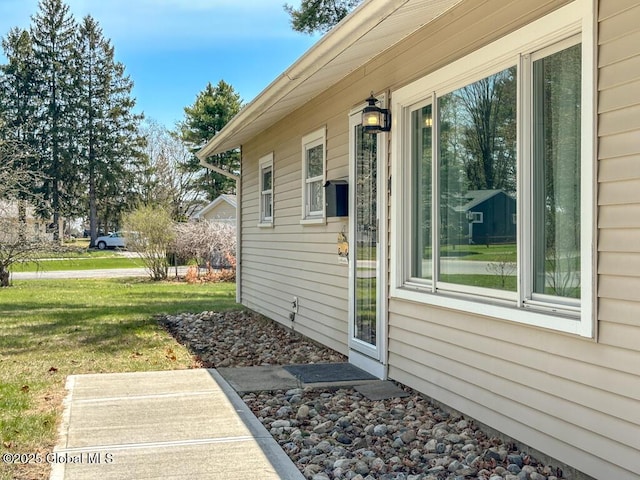 exterior space with a yard