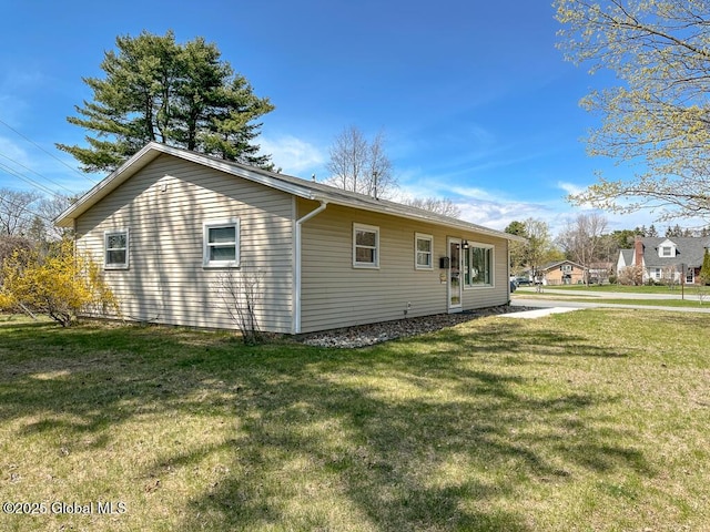 view of front of home with a front yard