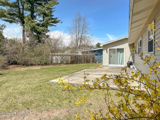 view of yard with fence and a patio area