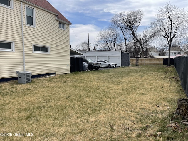 view of yard featuring fence and cooling unit