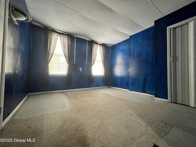 66 Jefferson St, Troy, NY 12180 - spare room with a drop ceiling, carpet floors, and baseboards