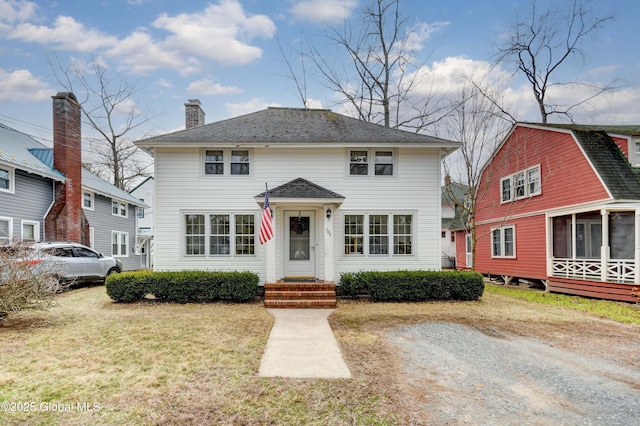 107 Mckinley Ave, Northampton, NY 12134 - view of front of property with a chimney and a front lawn