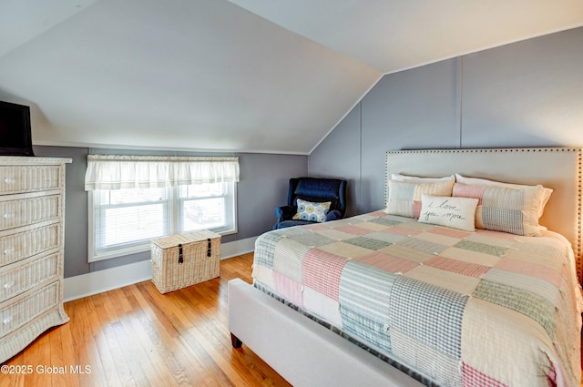 107 Mckinley Ave, Northampton, NY 12134 - bedroom featuring vaulted ceiling, baseboards, and wood-type flooring