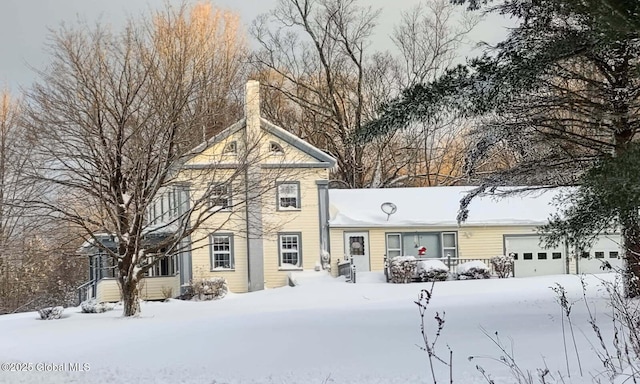 230 S Rd, Stephentown, NY 12018 - view of front of house with a chimney and an attached garage
