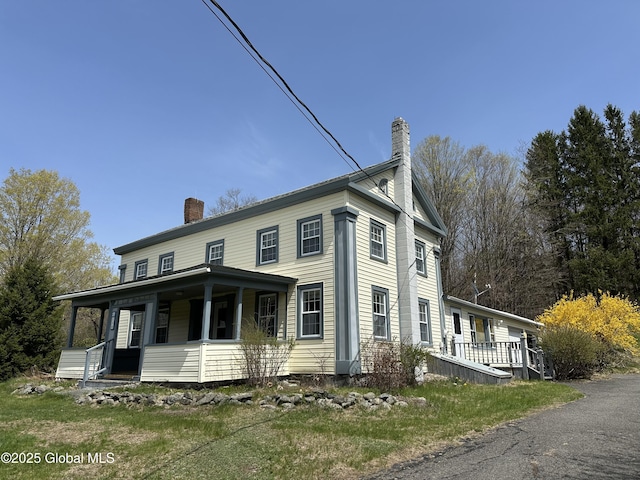 230 S Rd, Stephentown, NY 12018 - view of front of home with a chimney and a porch