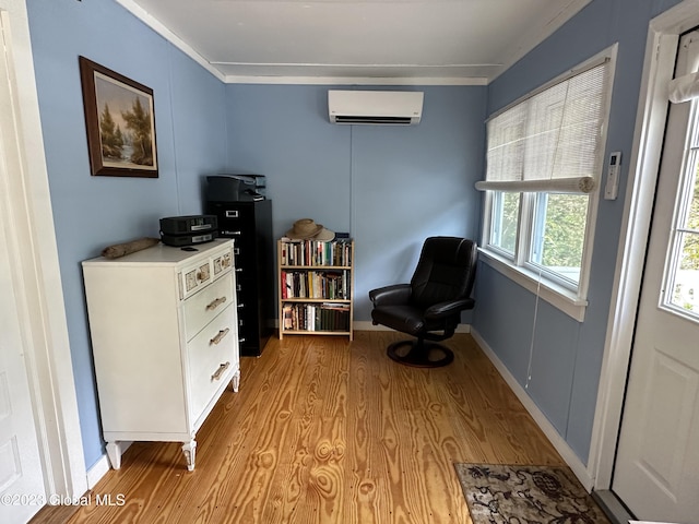 6325 Sunset Bay Rd, Dresden, NY 12841 - living area featuring light wood finished floors, an AC wall unit, and baseboards