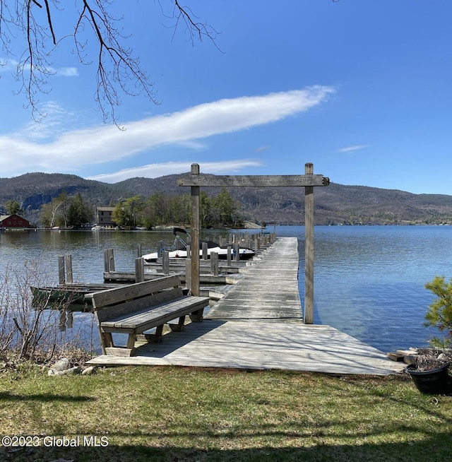 6325 Sunset Bay Rd, Dresden, NY 12841 - dock area with a water and mountain view