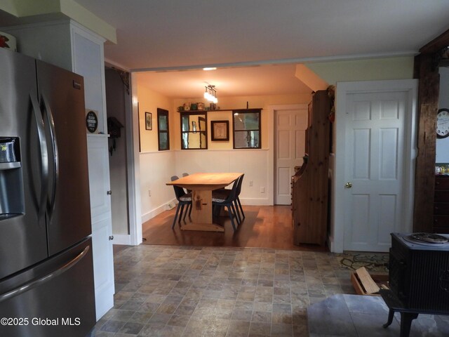 116 Dennie Rd, Mayfield, NY 12117 - dining space featuring stone finish floors and baseboards