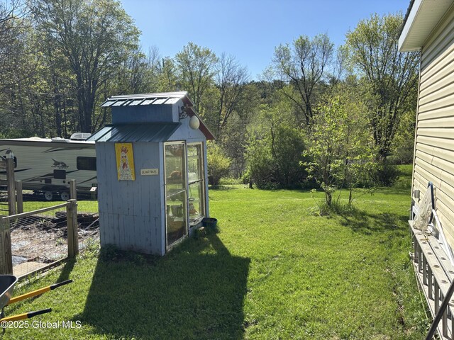 116 Dennie Rd, Mayfield, NY 12117 - view of grassy yard with an outbuilding
