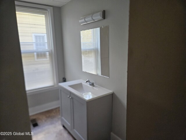 235 5th Ave, Troy, NY 12180 - bathroom with baseboards and vanity