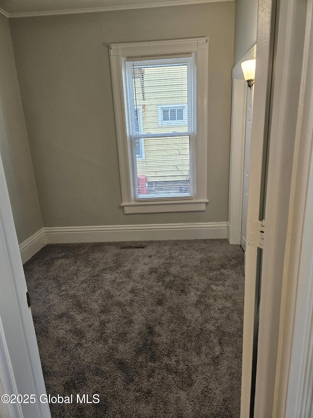 235 5th Ave, Troy, NY 12180 - carpeted empty room with baseboards and ornamental molding