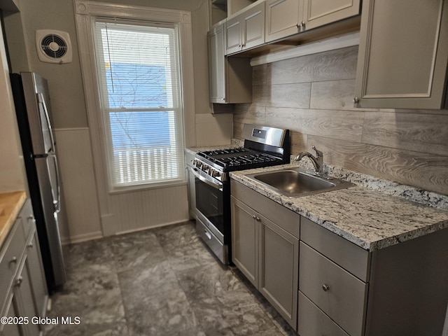 235 5th Ave, Troy, NY 12180 - kitchen with a healthy amount of sunlight, stainless steel appliances, visible vents, and a sink