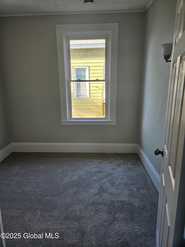 235 5th Ave, Troy, NY 12180 - empty room featuring baseboards, carpet flooring, and visible vents