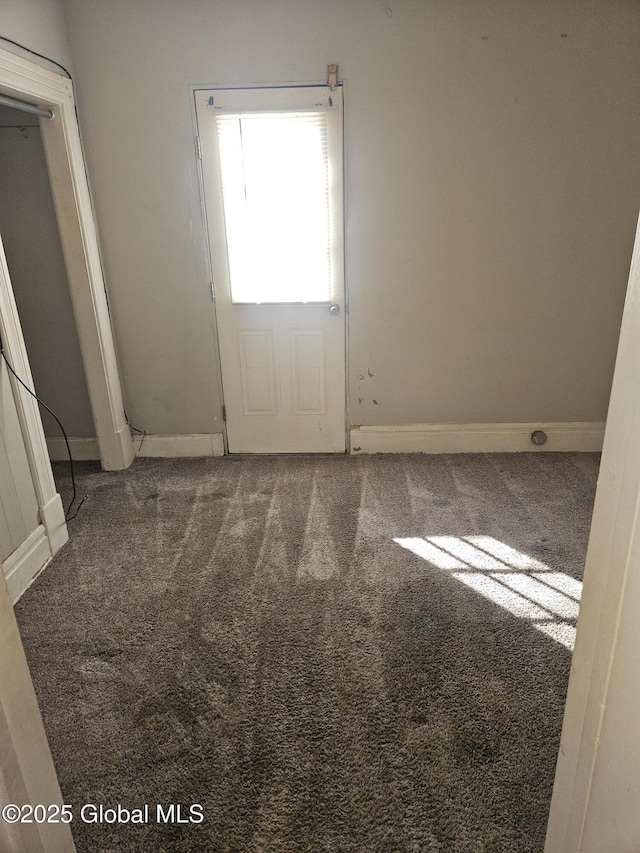 235 5th Ave, Troy, NY 12180 - carpeted empty room with baseboards