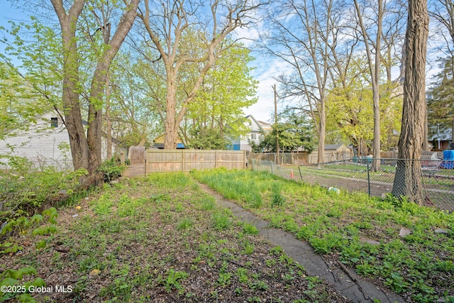 view of yard with fence