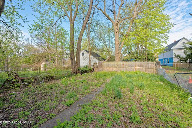view of yard featuring fence