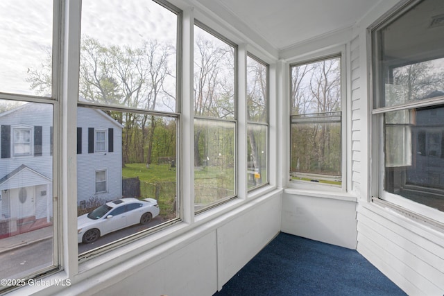 sunroom / solarium with a wealth of natural light