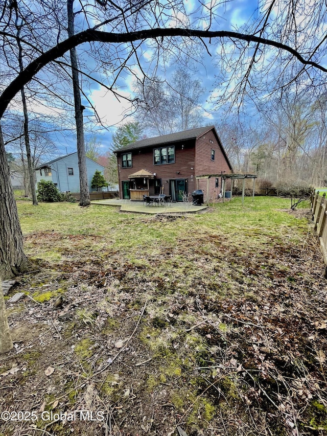 rear view of house with brick siding